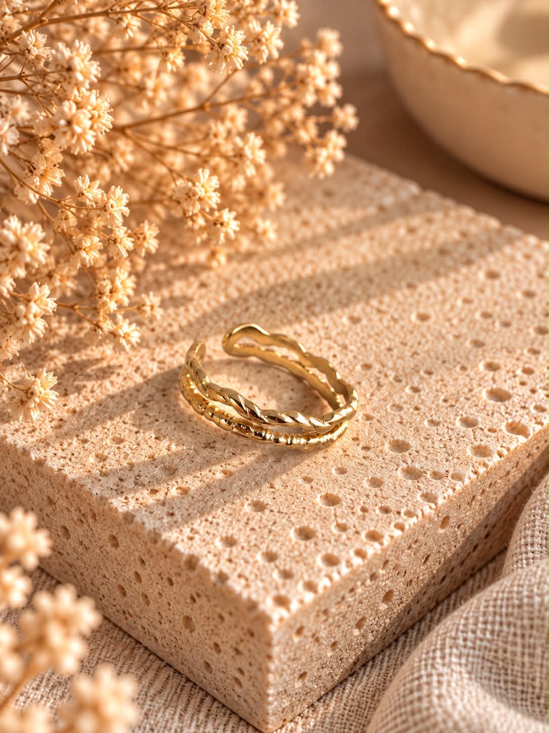 Bague tressée dorée
